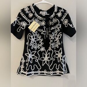 Lauren Michelle Floral Embellished Embroidery
White On Black Ruffled Tunic Top